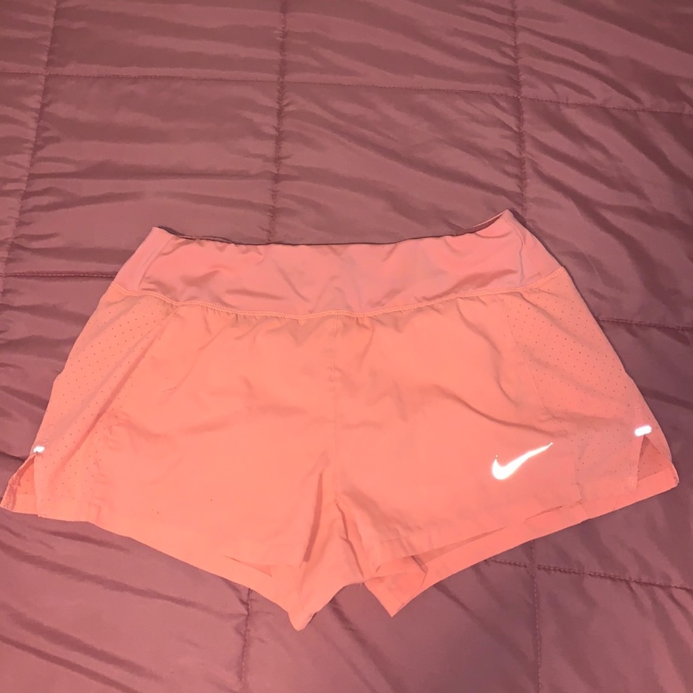 Coral orange, nike running short